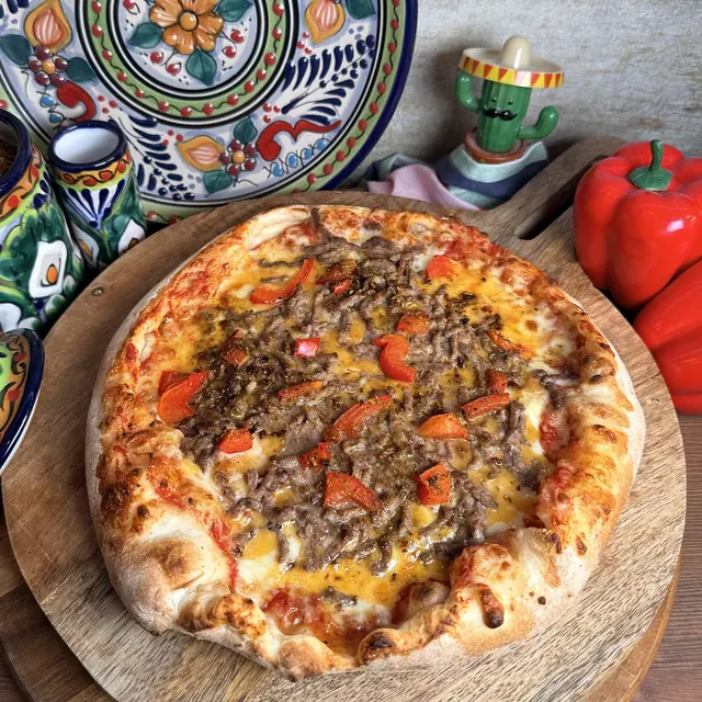 La Tex-Mex : pizza au bœuf haché, cheddar, mozzarella et poivrons